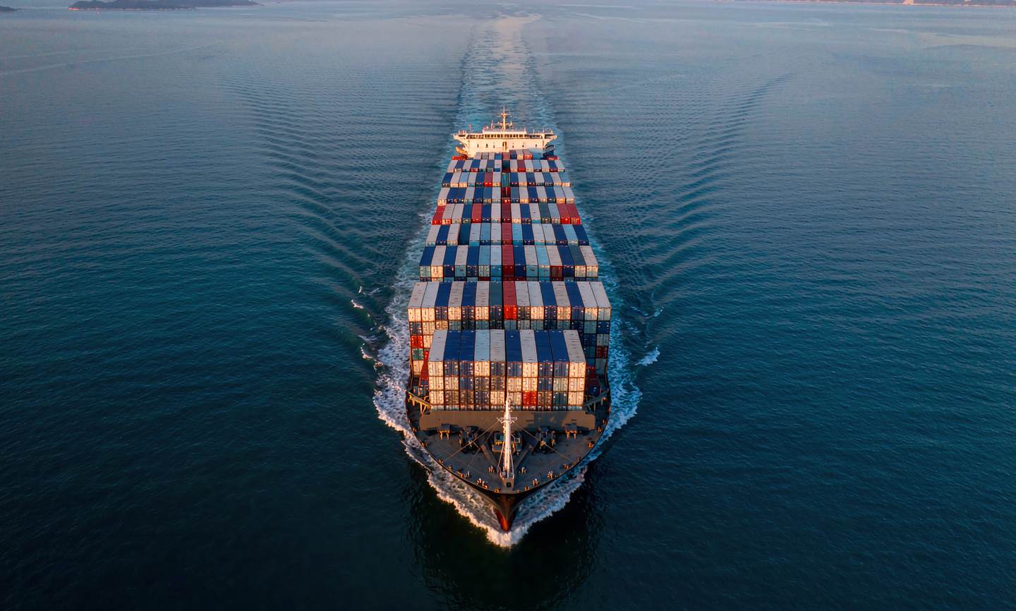 Fully loaded container vessel at sea